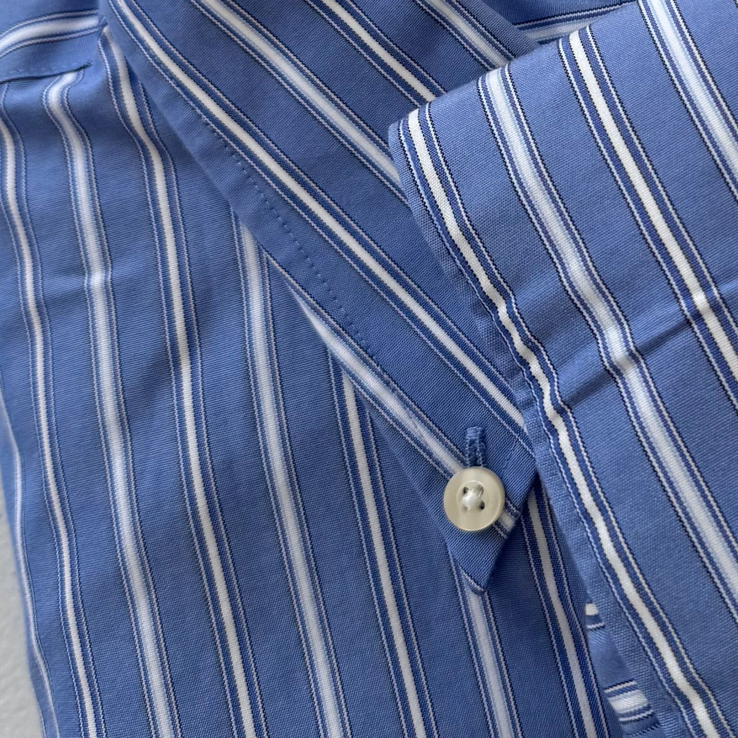 blue pinstripe personalized vintage button up close up